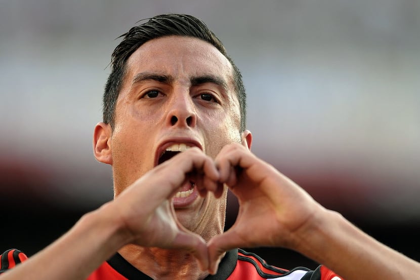 River Plate's defender Ramiro Funes Mori celebrates after scoring a goal against Olimpo...