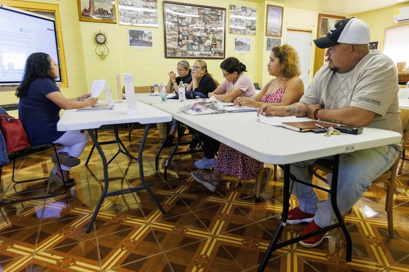 Victoria Hohn quizzes students during a citizenship class at Casa Guanajuato in Oak Cliff,...