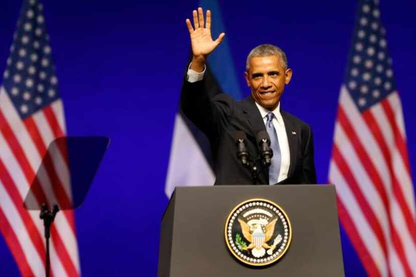 
President Barack Obama speaks about immigration while Vice President Joseph Biden listens...