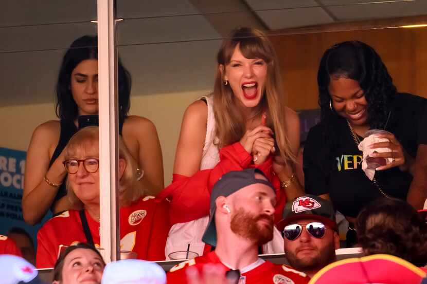 Taylor Swift, center, attended the Kansas City Chiefs NFL football game against the Chicago...