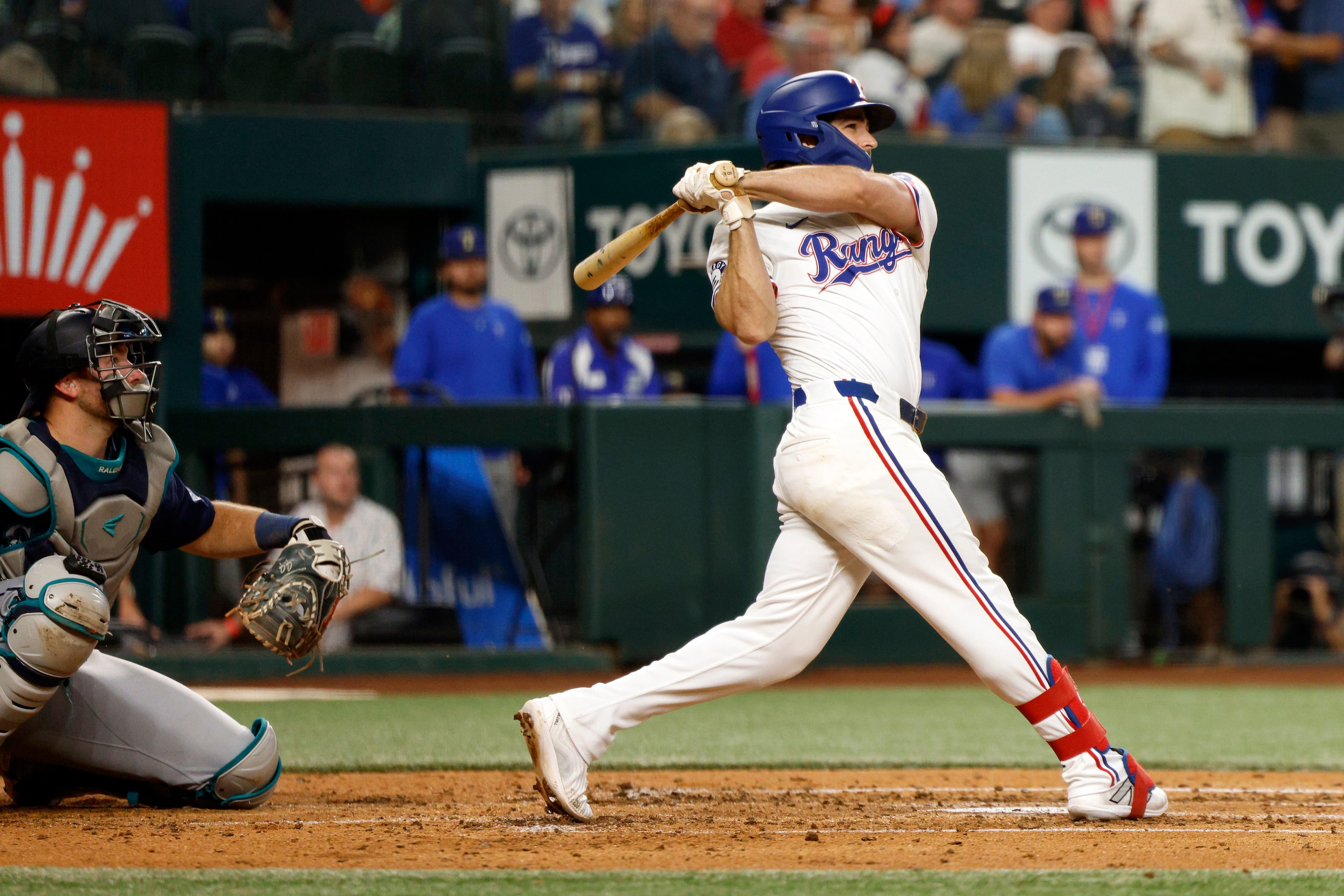 Texas Rangers shortstop Josh Smith (8) hits a two-run home run during the third inning...