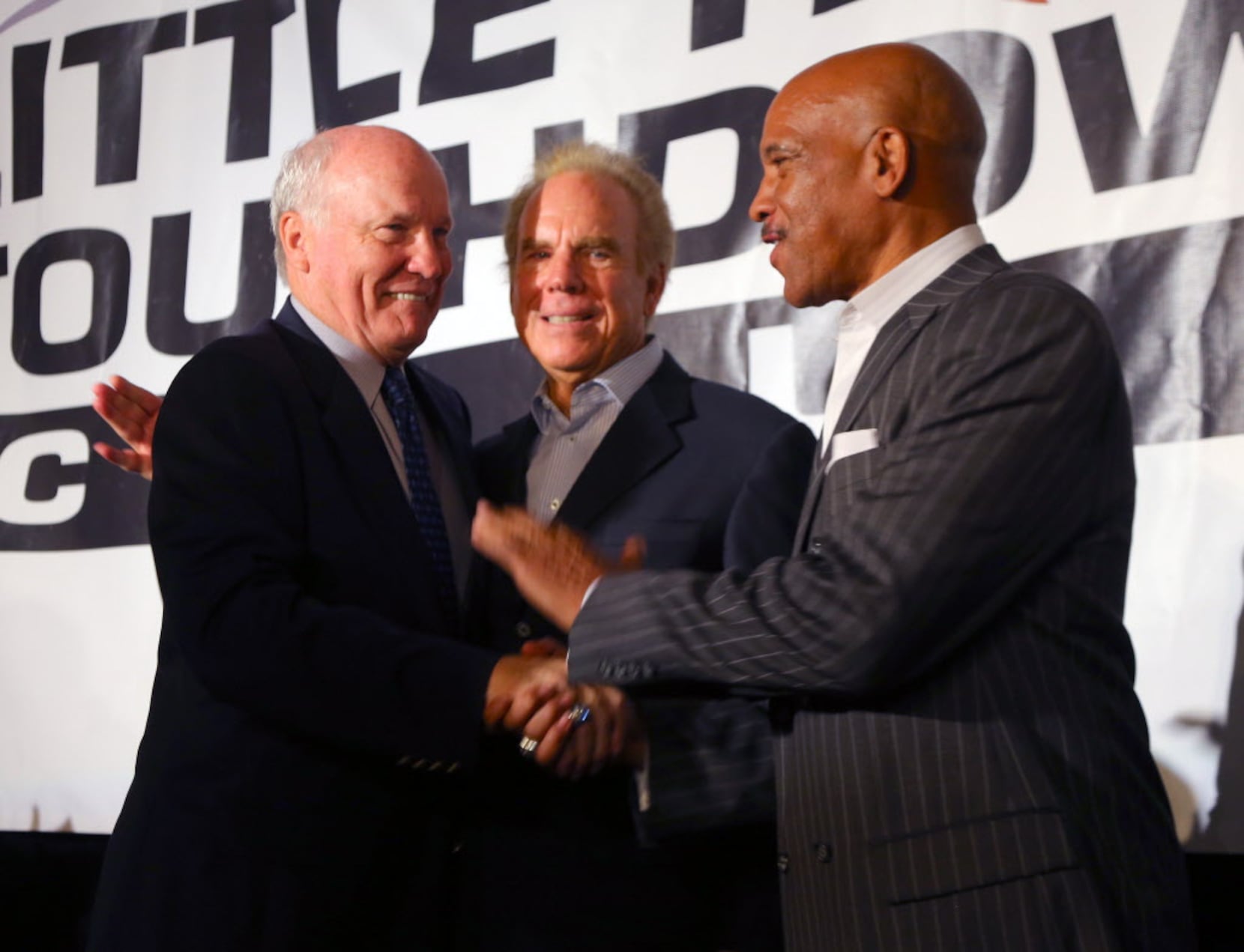 Cowboys honor hall of famers Johnson, Pearson, Harris