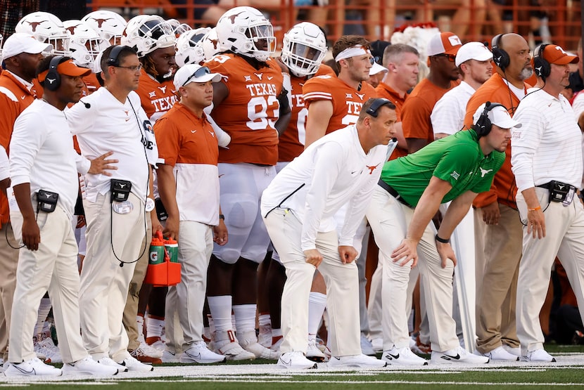 Texas Longhorns head coach Steve Sarkisian (center) watches his team face the...