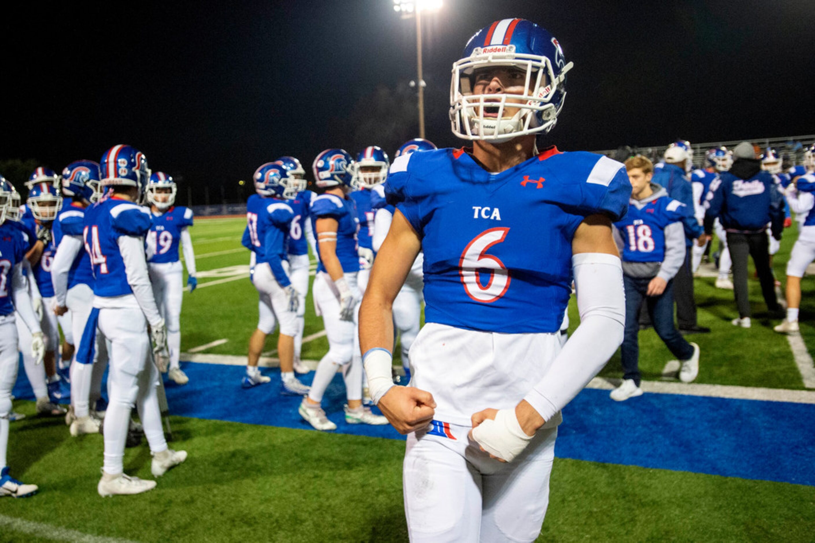 TCA-Addison linebacker Clarke Pino (6) celebrates a defensive stop in the first half of a...