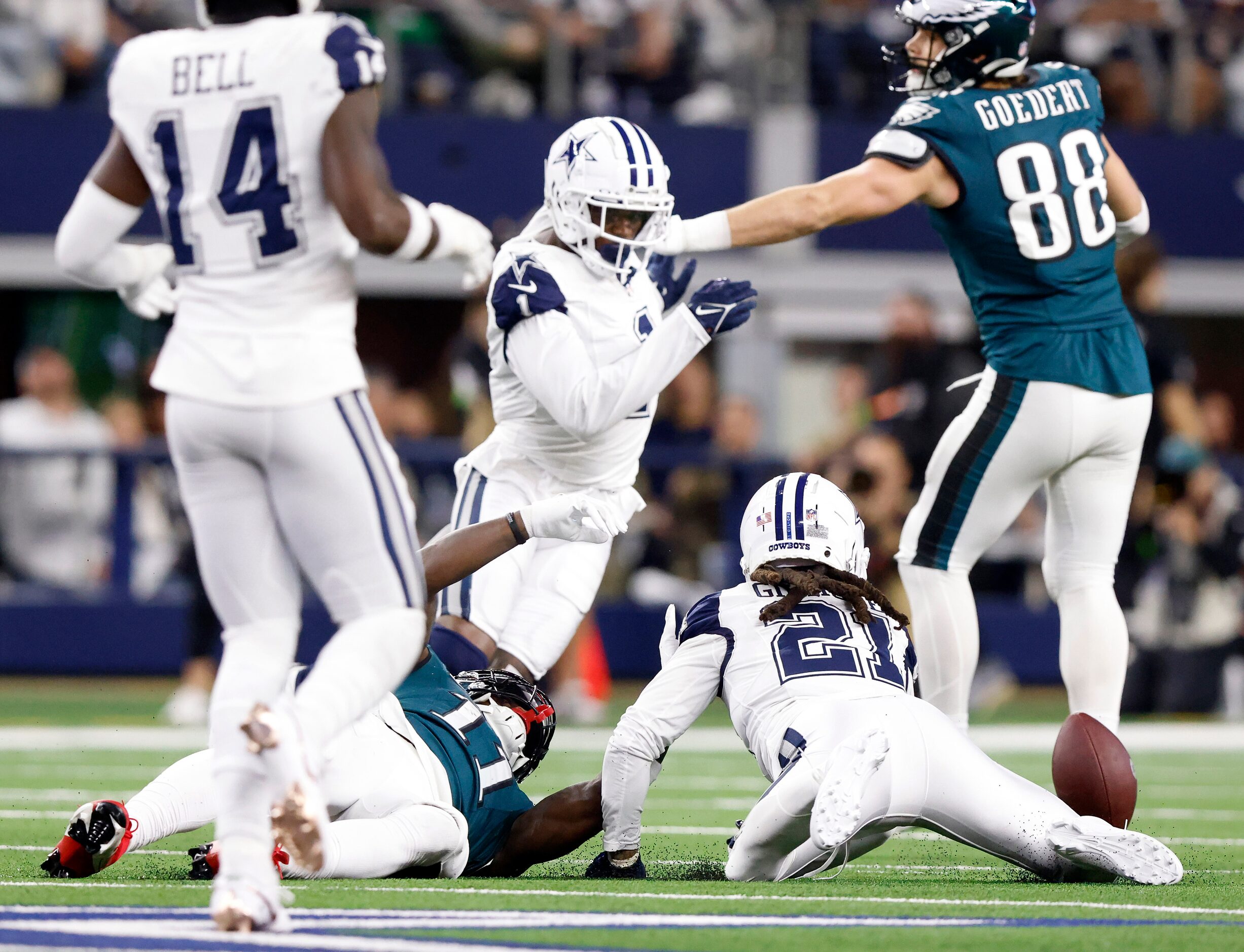 Philadelphia Eagles wide receiver A.J. Brown (11) fumbles the ball after being tackled by...