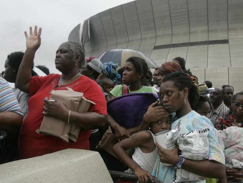 Dianne Wallace, left,  Alexis Fisher, 14,  Dejon Fisher, 8, and her mother Cavel Fisher...