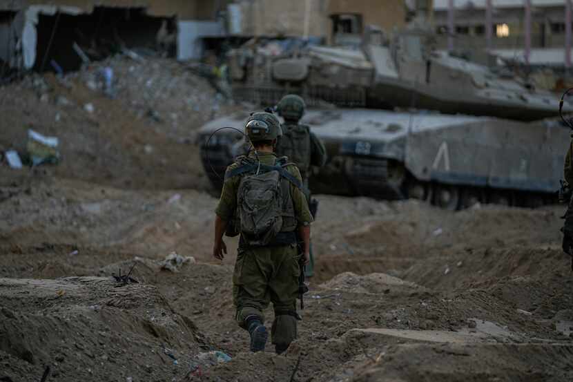 Israeli soldiers are seen during a ground operation in the Gaza Strip, Wednesday, Nov. 8,...