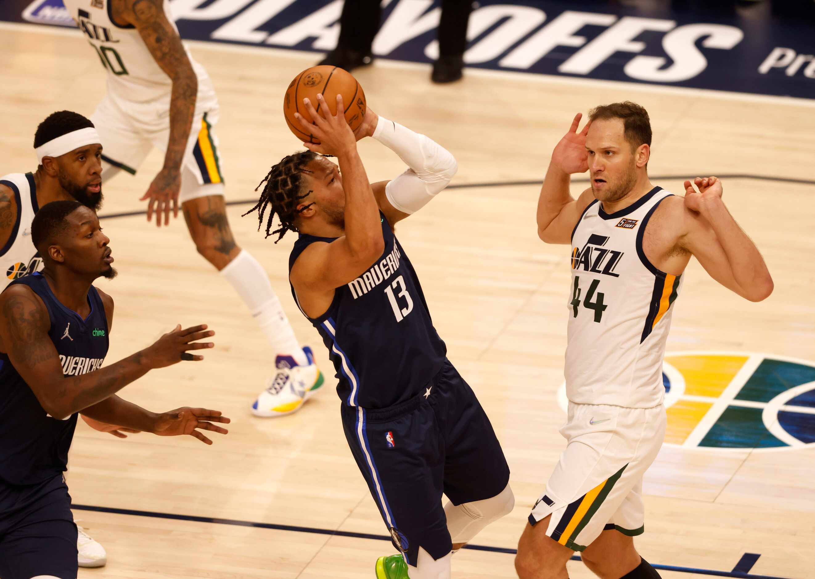 Dallas Mavericks guard Jalen Brunson (13) attempts a shot in front of Utah Jazz forward...