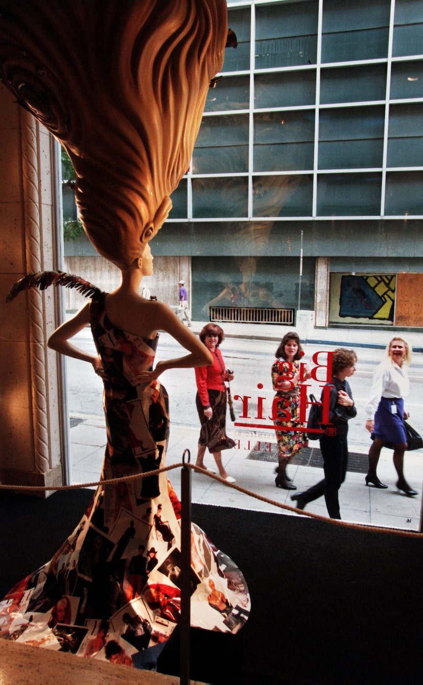 In 1997, pedestrians can't help but notice the "Big Hair" display in the windows of the...