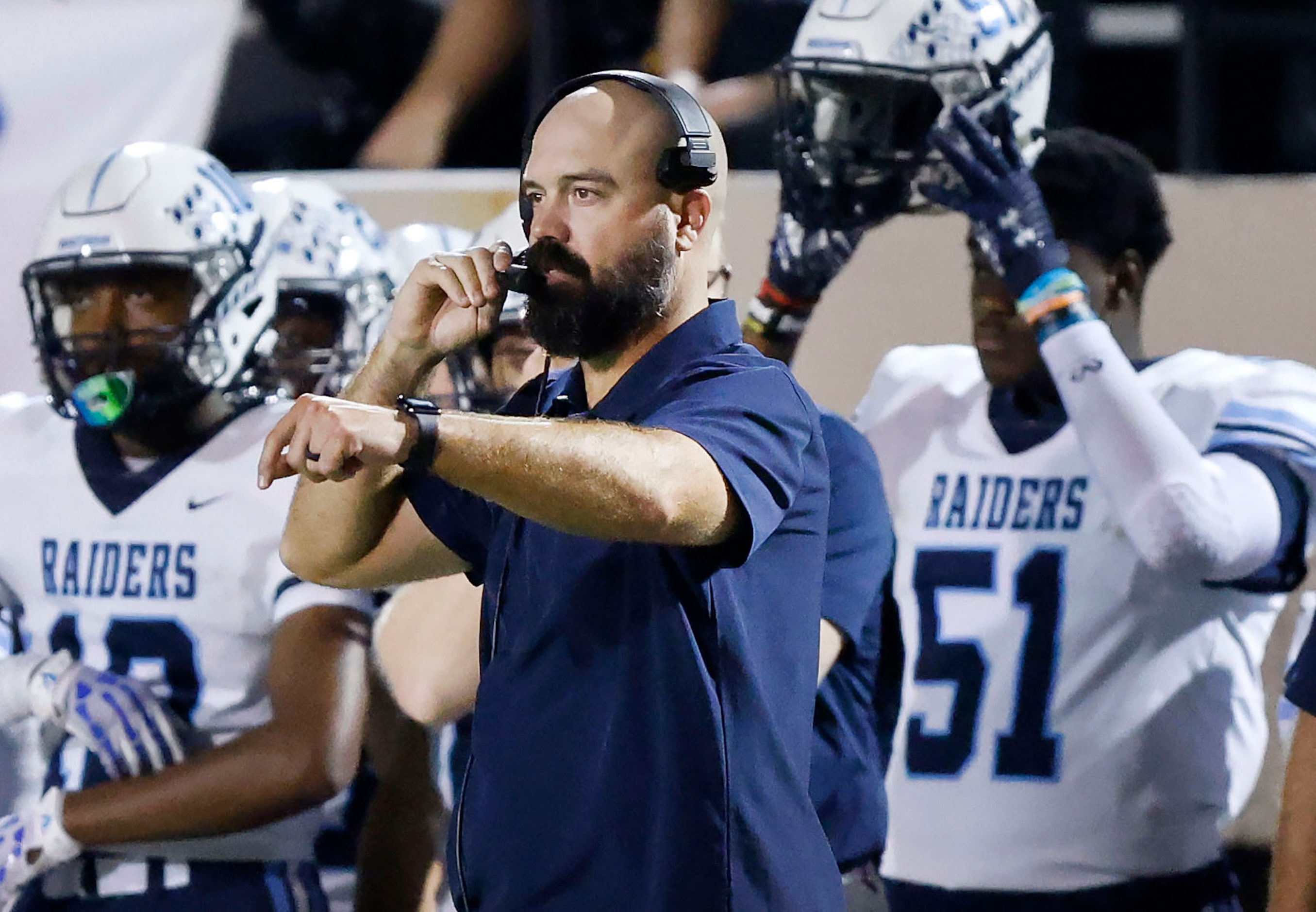 Hurst L.D. Bell head coach TJ Dibble watches from the sideline as his team faces Euless...