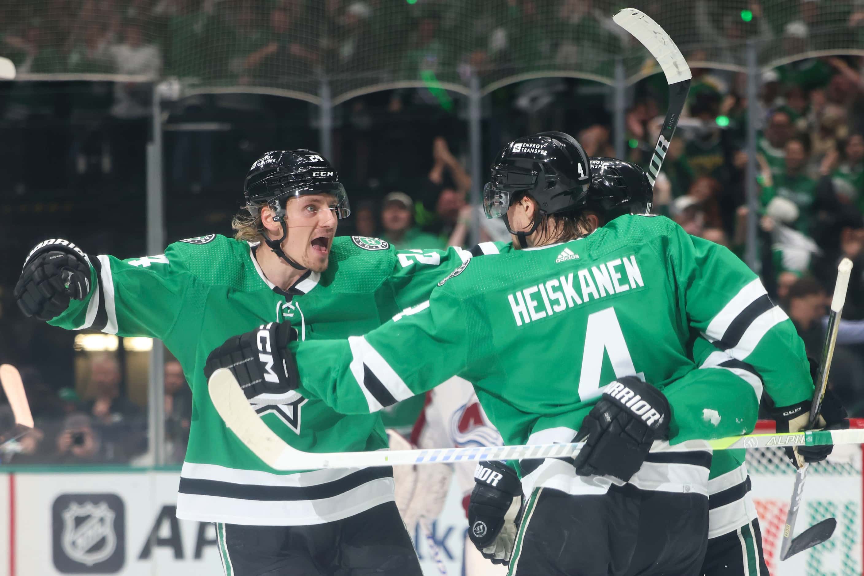 Dallas Stars center Roope Hintz (left) cheers after a goal scored by defenseman Miro...