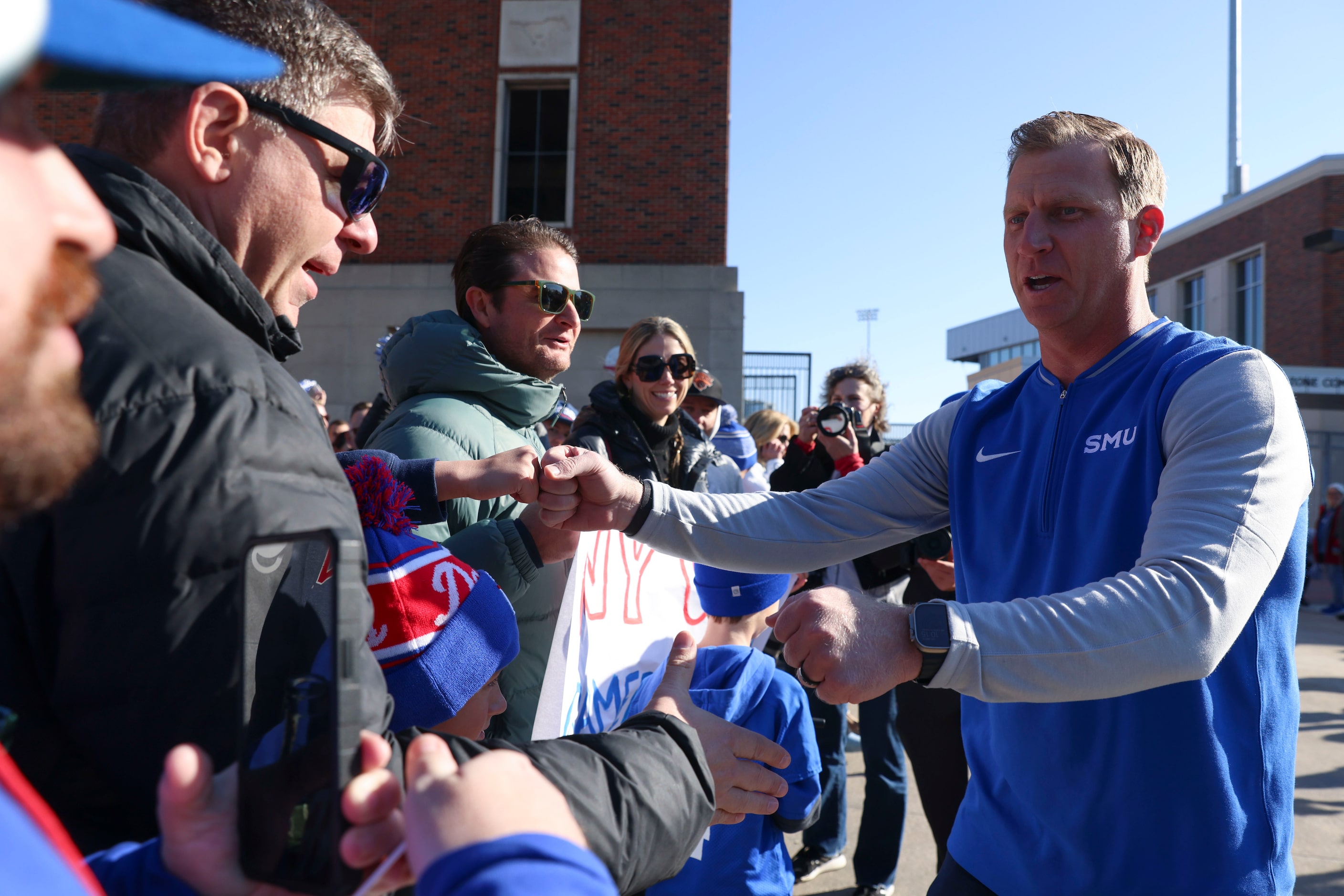 SMU head coach Rhett Lashlee greets the fans during a send-off party for the football team...