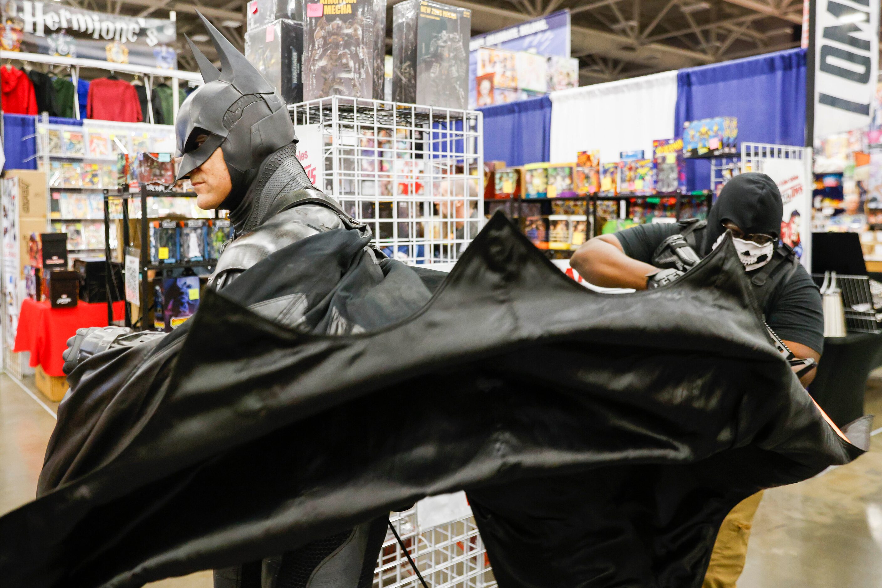 Will Ellis dressed as Batman shows off for a photo opportunity during Fan Expo Dallas on...