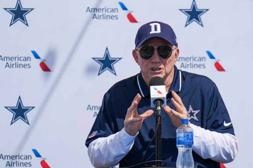 Dallas Cowboys owner and general manager Jerry Jones addresses reporters during pre-training...
