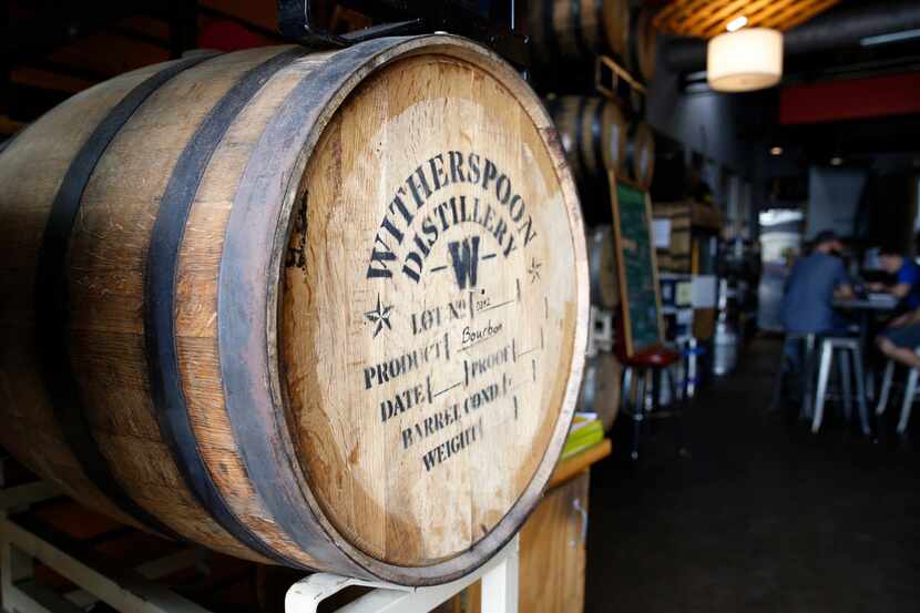 Some of the Witherspoon Distillery barrels used to age beer brewed at Braindead Brewing in...
