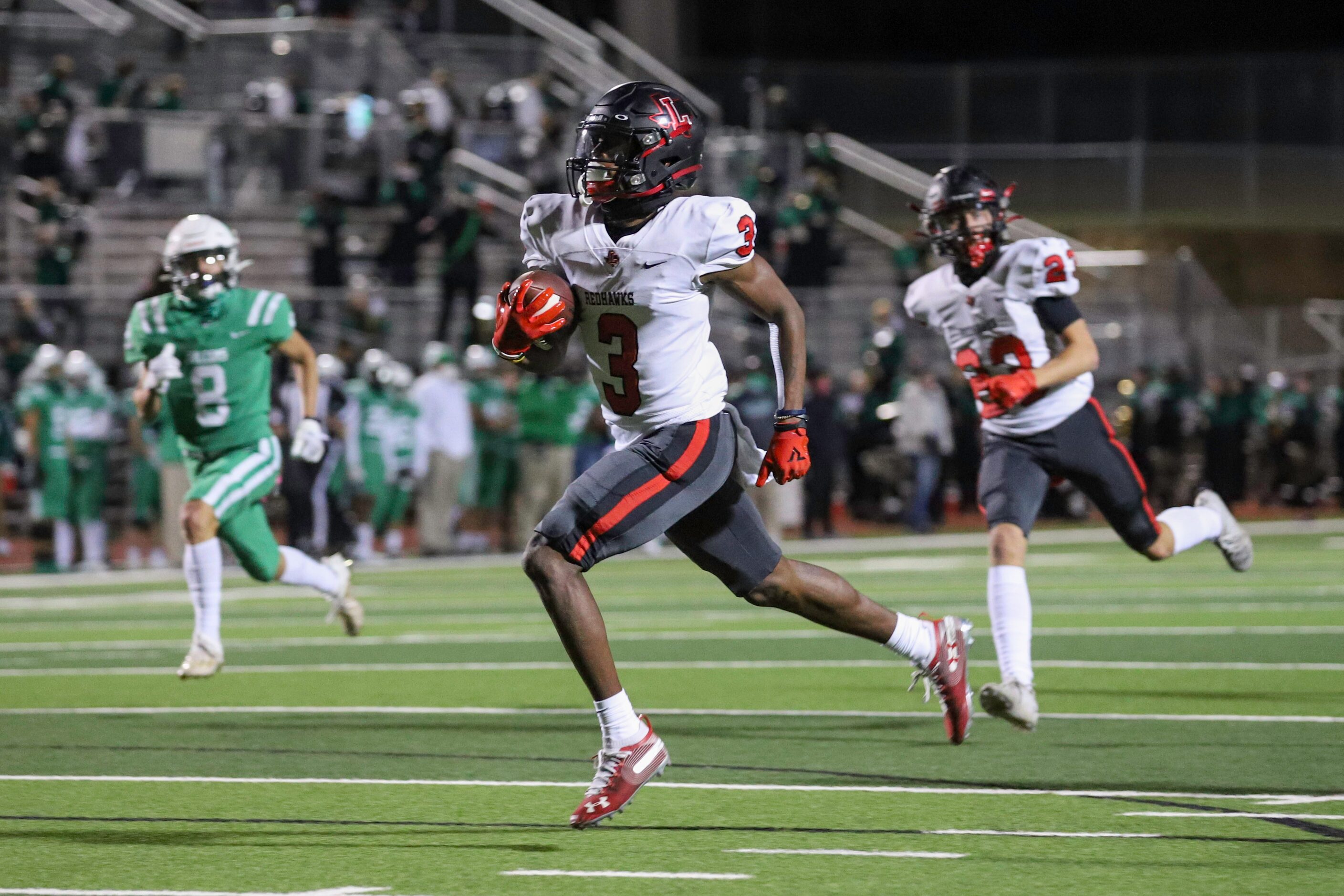 Frisco Liberty running back Evan Stewart (3) runs for a touchdown during the first half...