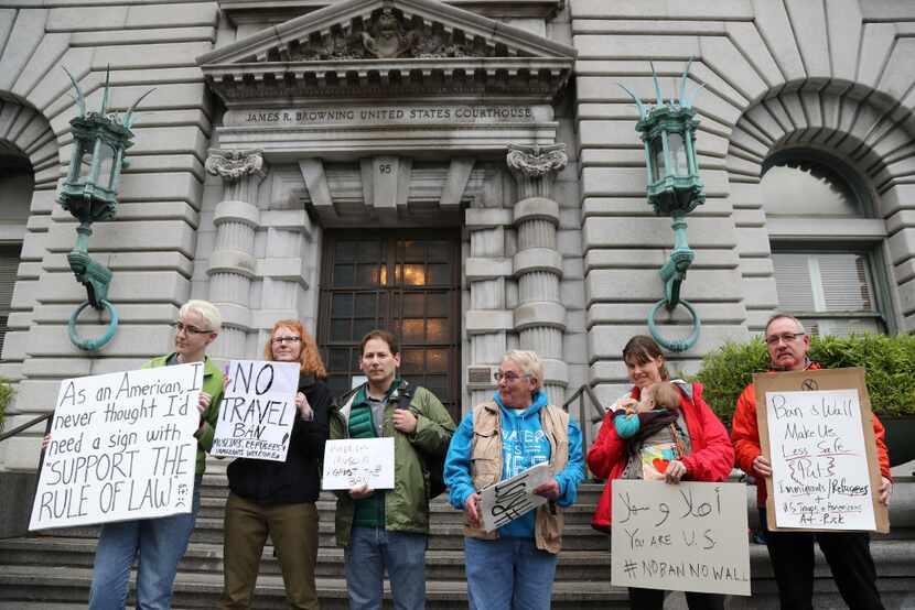 Demonstrators were on hand Tuesday outside the 9th U.S. Circuit Court of Appeals in San...