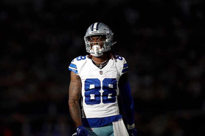 Dallas Cowboys wide receiver CeeDee Lamb (88) spotlighted by sunlight looks to defend during...