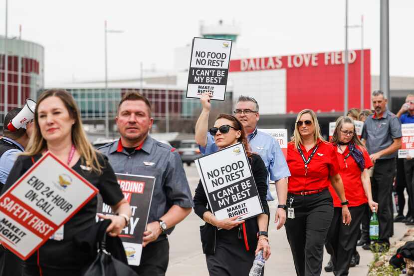 Southwest Airlines flight attendants picketing at Dallas Love Field in March over stalled...