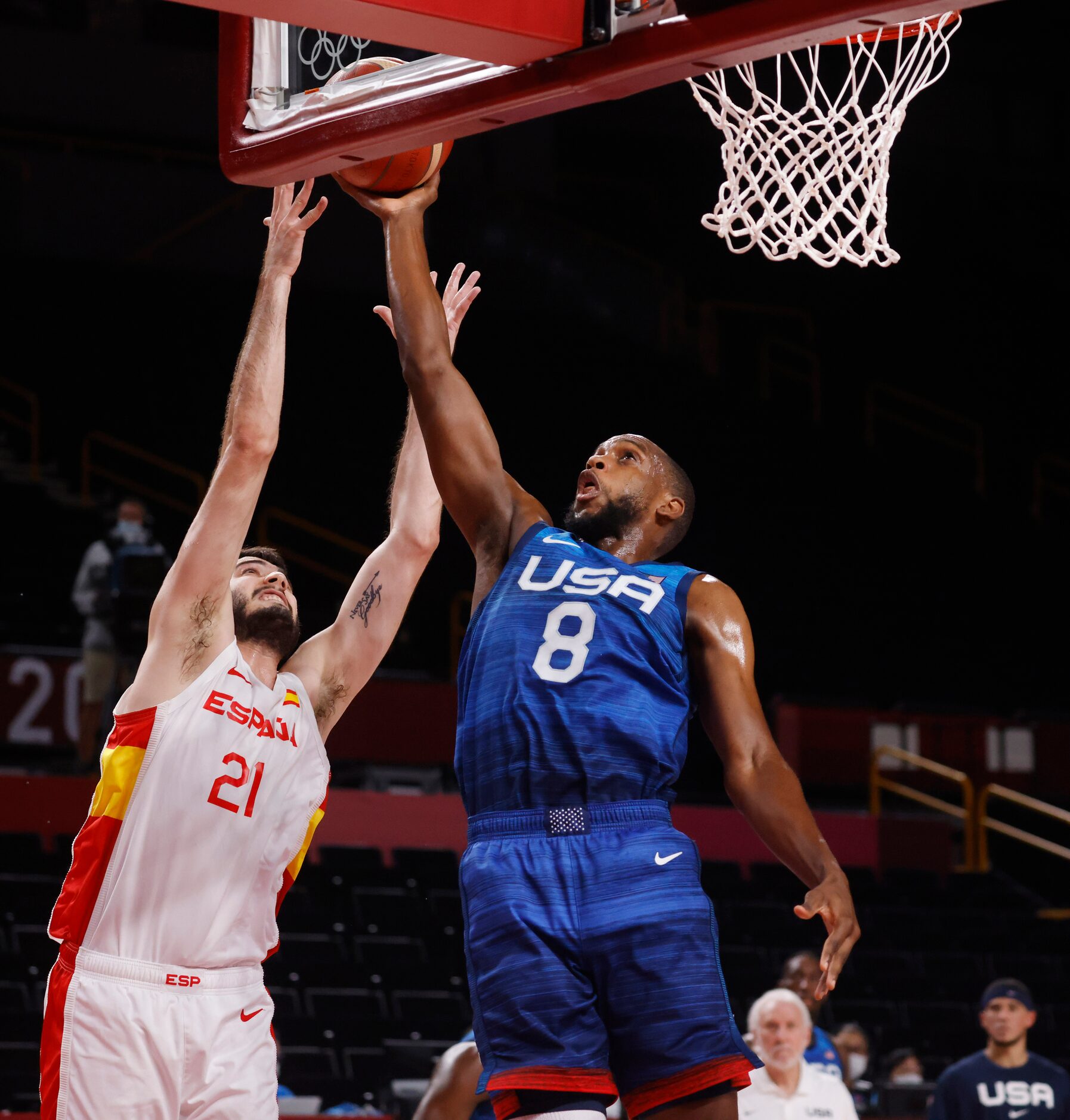 USA’s Khris Middleton (8) attempts a shot in front of Spain’s  Alex Abrines (21) during the...