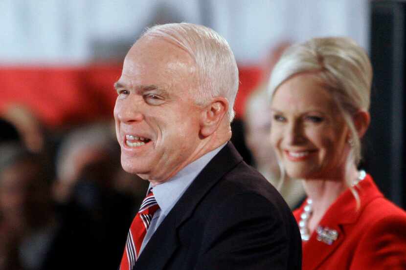 In this Jan. 8, 2008 file photo, Sen. John McCain, R-Ariz., with wife Cindy, addresses...