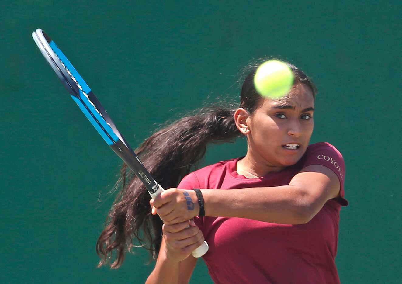Sriya Leesha Gourammagari, of Frisco Heritage, returns a serve in a 5A girls singles match....