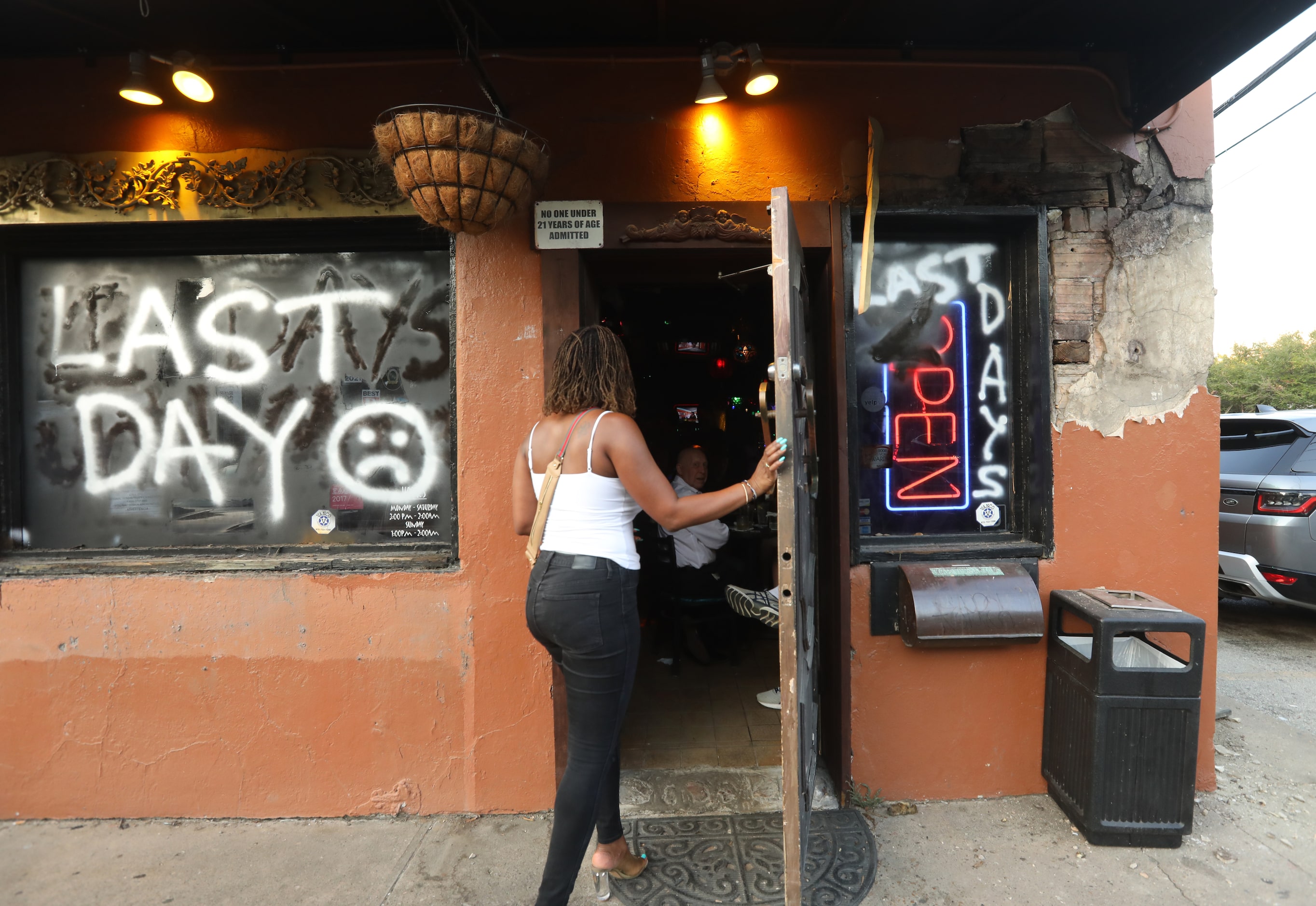 Ayona Anderson heads inside to meet friends for a final evening at the Grapevine Bar in...