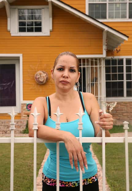 Erika Denova poses for a photograph at her home in South Dallas on Aug. 23, 2017. Denova was...