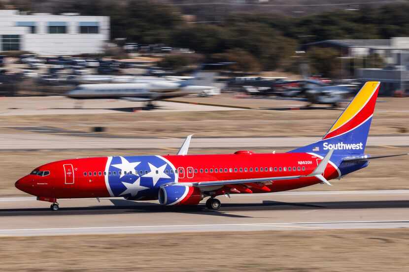 A Southwest Airlines plane prepares for takeoff Wednesday at Dallas Love Field as the...