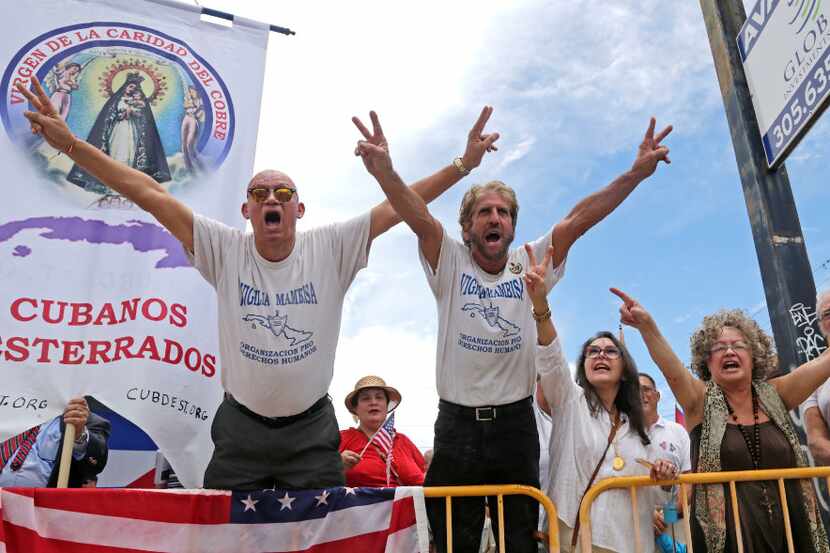 Cuban-Americans celebrate President Donald Trump's revised Cuban policy announcement,...