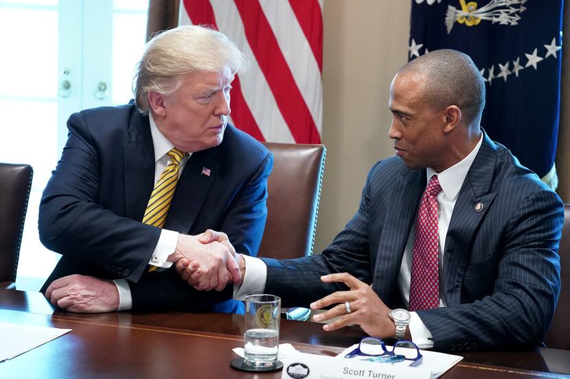  President Donald Trump shakes hands with White House Opportunity and Revitalization Council...