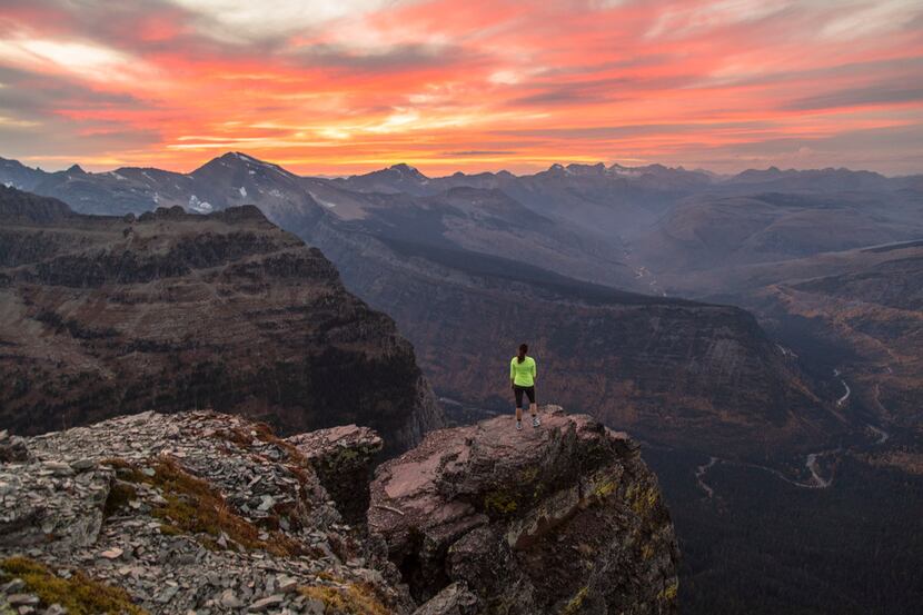 A hiker takes in the expansive scene at Glacier National Park in late September. 