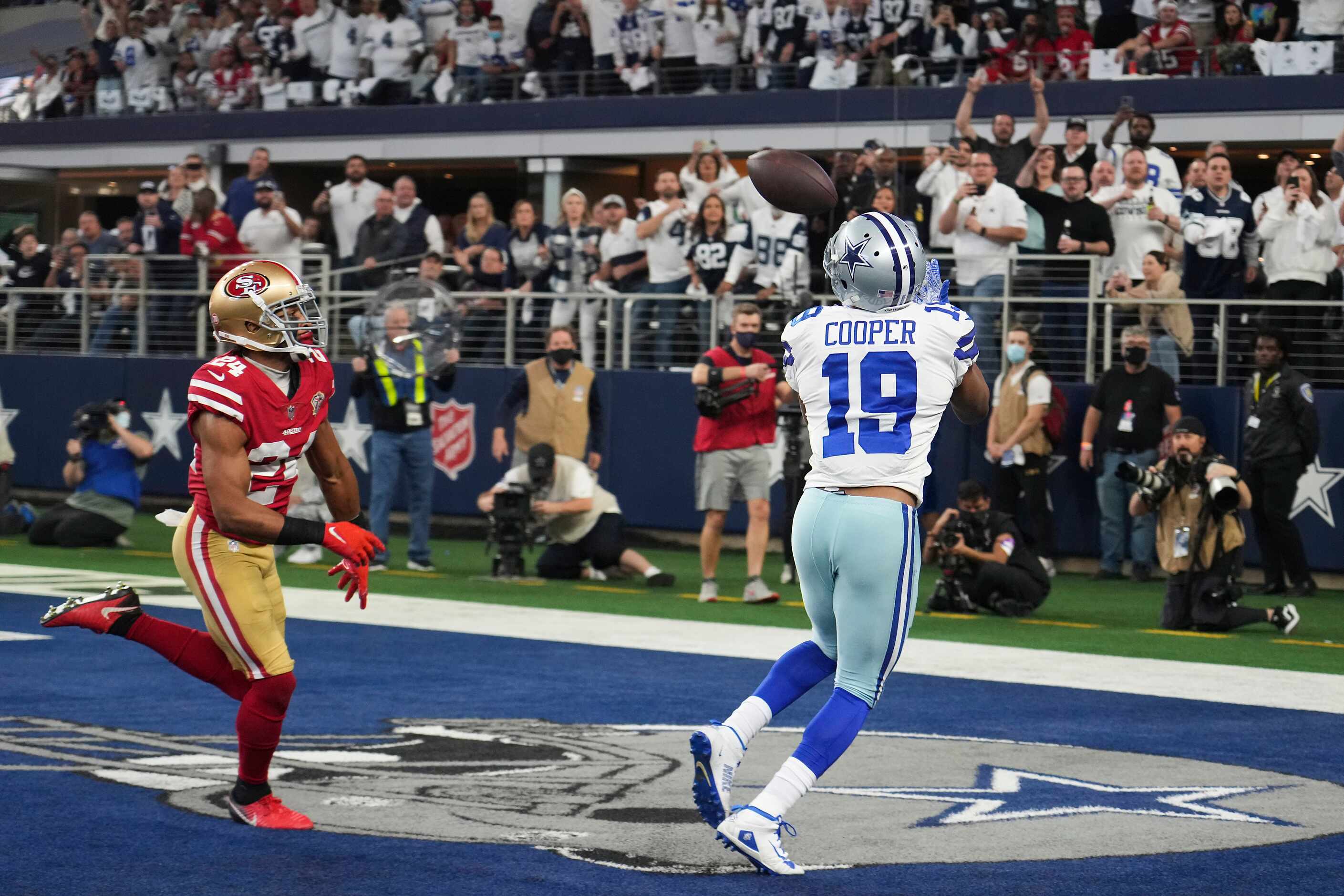 Dallas Cowboys wide receiver Amari Cooper (19) hauls in a touchdown pass as San Francisco...