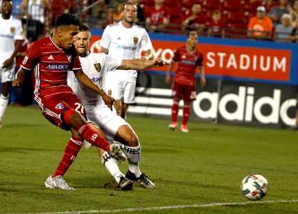 FILE - FC Dallas forward Jesus Ferreira (27, left), age 16, scores his first-ever goal --...