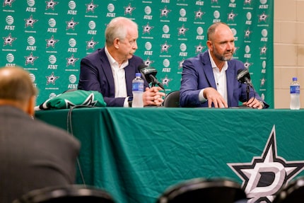 Peter DeBoer, Dallas Stars head coach (right), speaks alongside Jim Nill, Dallas Stars...