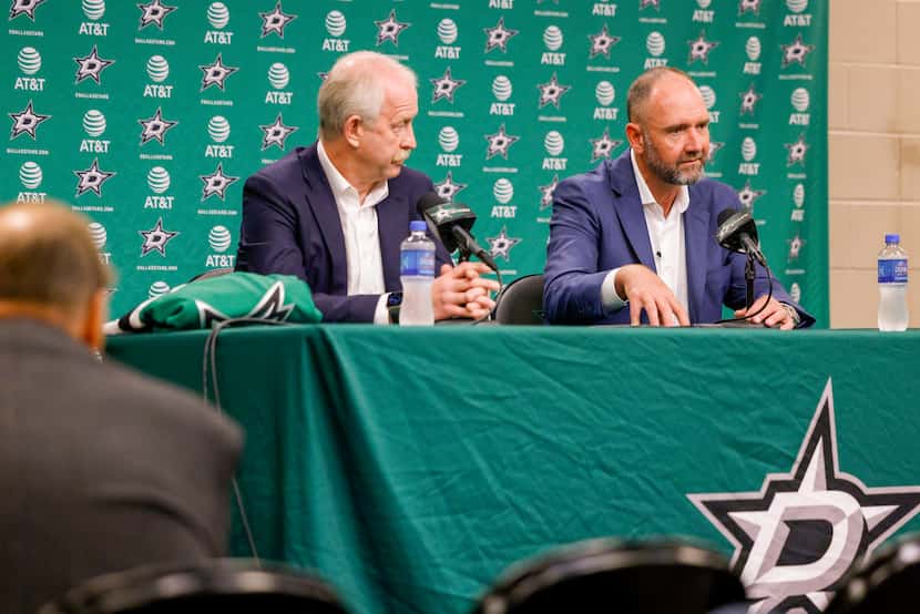 Peter DeBoer, Dallas Stars head coach (right), speaks alongside Jim Nill, Dallas Stars...