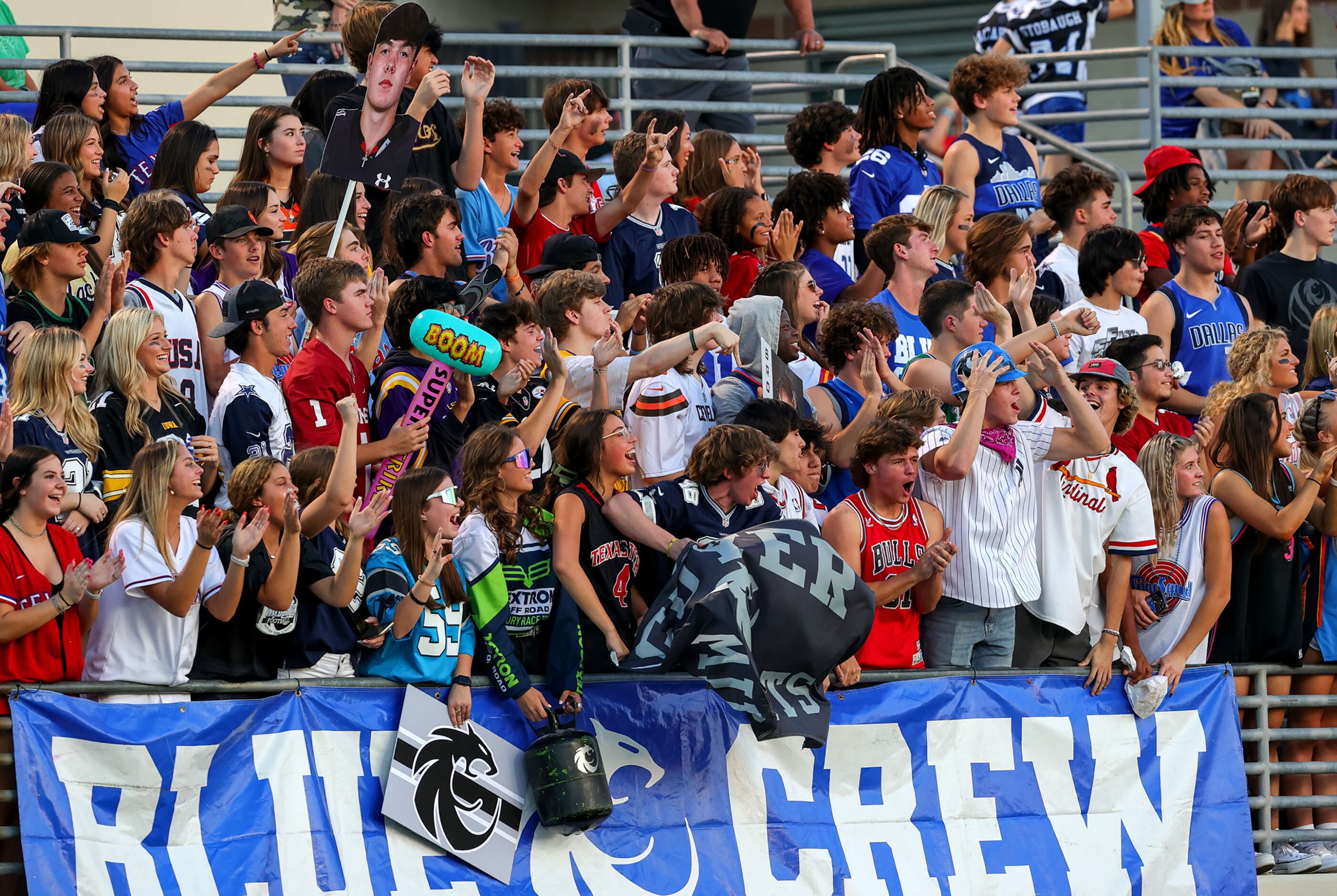 The Denton Guyer students cheer on their Wildcats against Denton Braswell during the first...