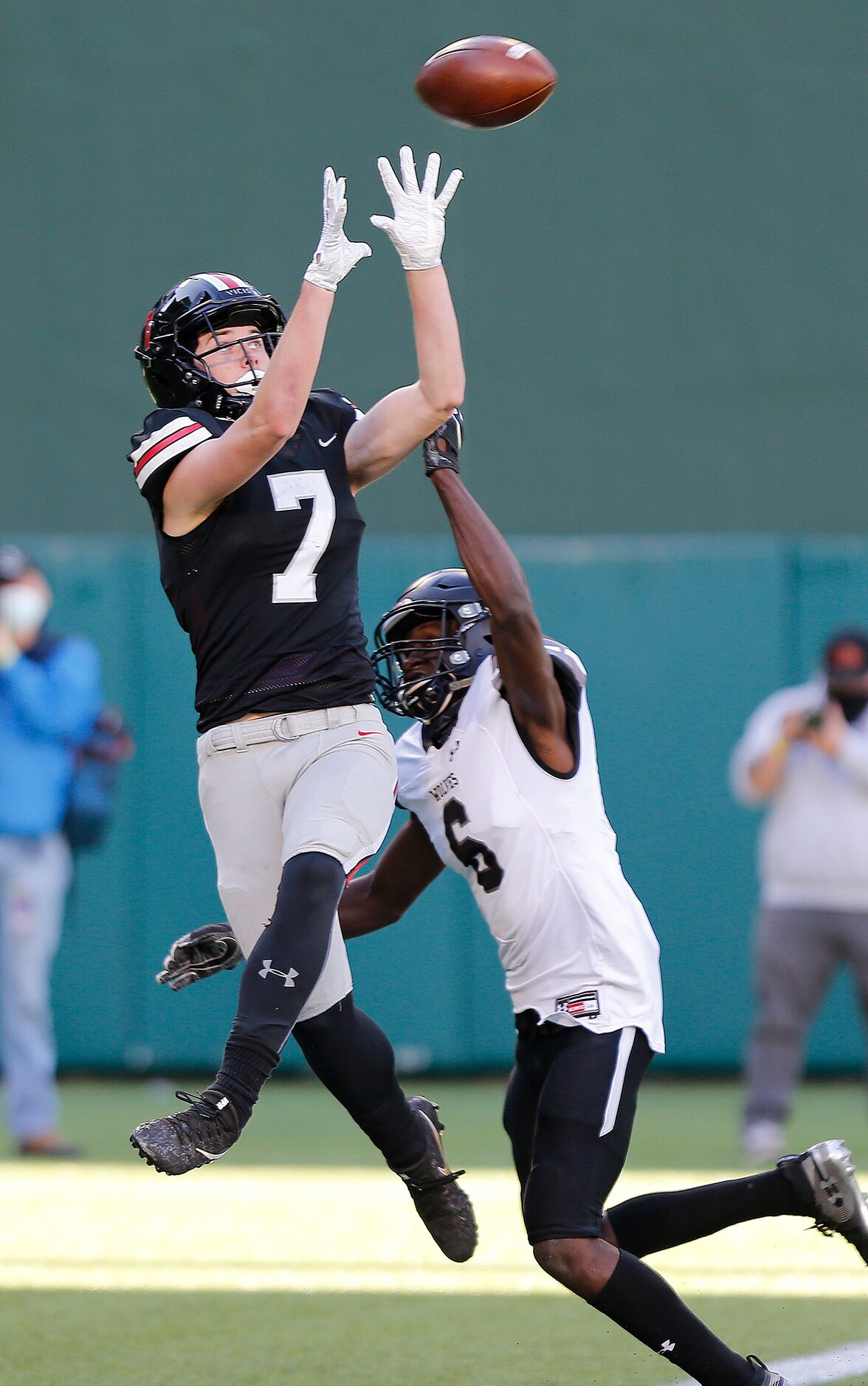 Lovejoy High School wide receiver Reid Westervelt (7) catches a touchdown behind Mansfield...