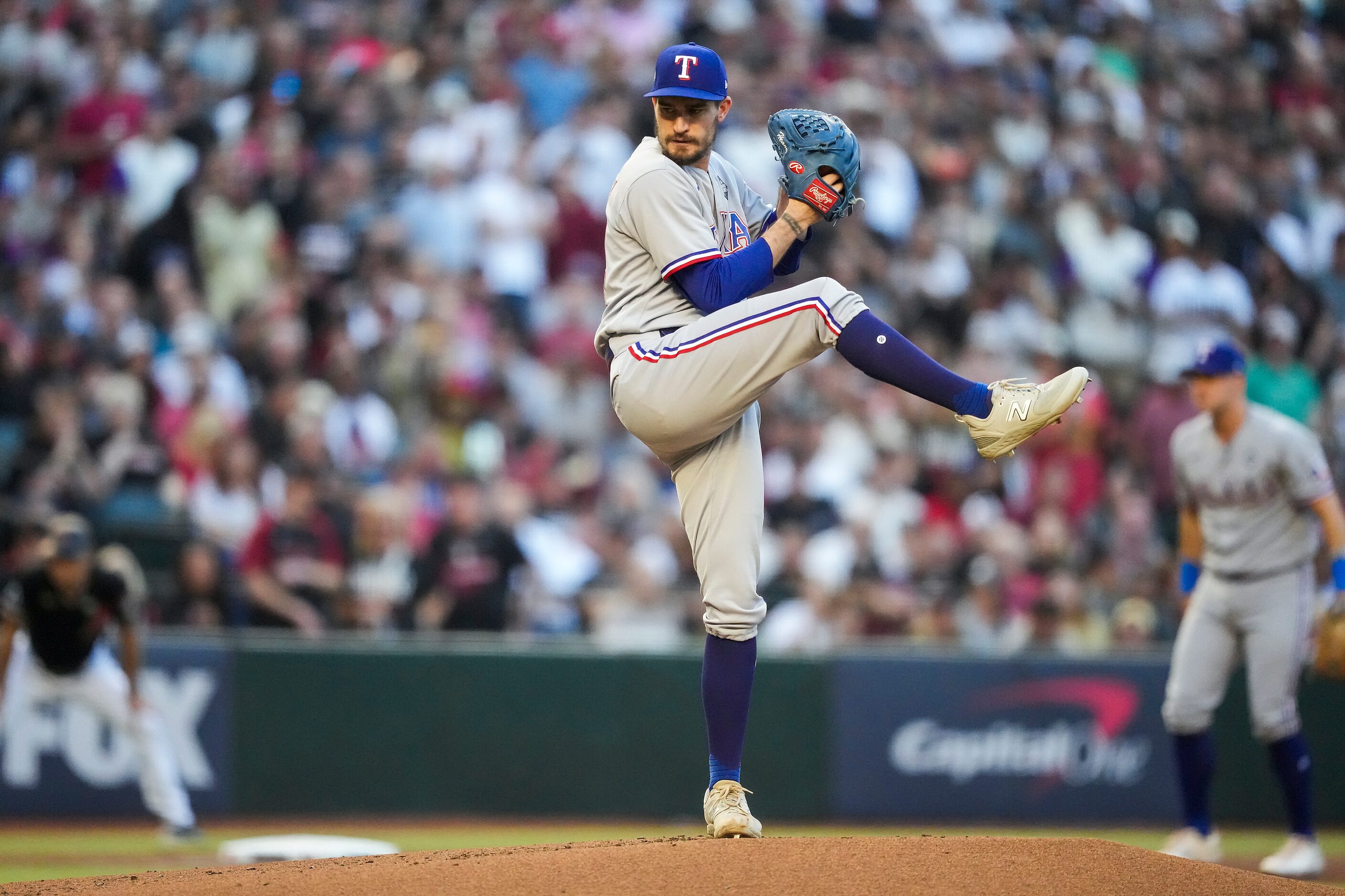 Texas Rangers pitcher Andrew Heaney pitches during the first inning against the Arizona...