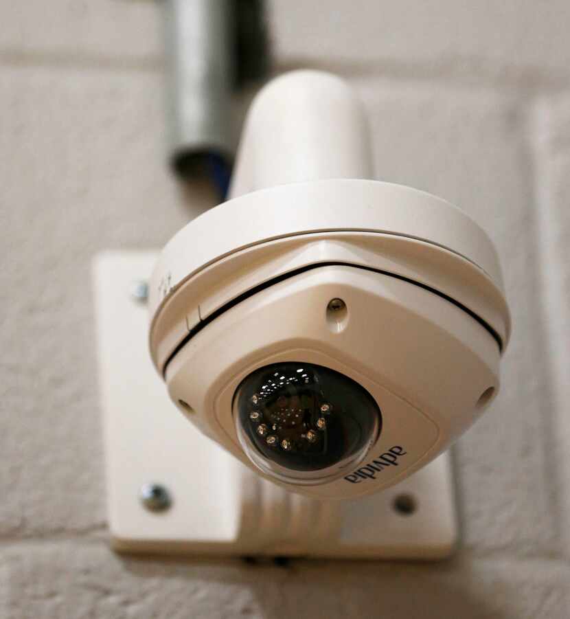 A security camera is posted in one of the gyms at Scott Johnson Middle School in McKinney.