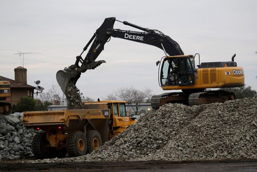 Rocks are loaded onto trucks as part of the efforts to repair the Oroville Dam on Wednesday....