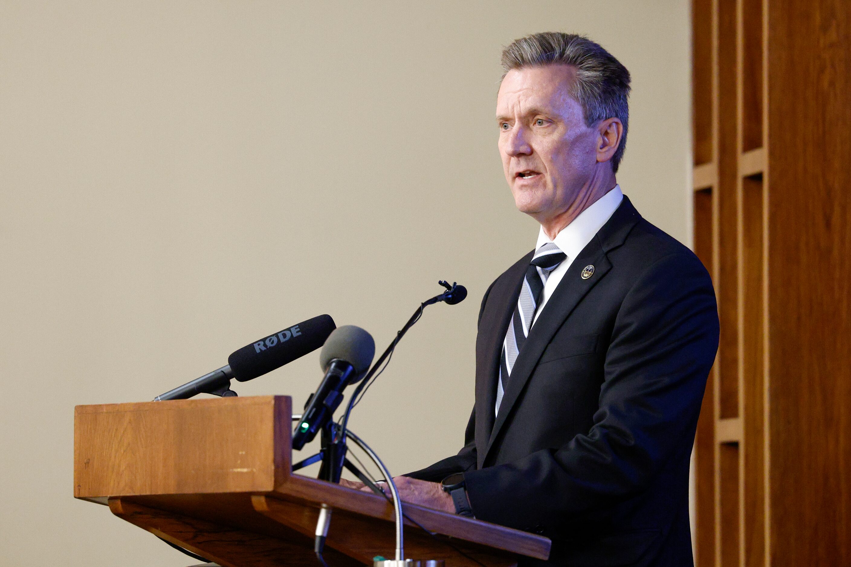 Steve Dye, former Grand Prairie police Chief, speaks during a funeral service for former...