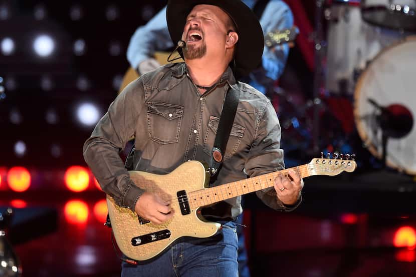 Garth Books will perform Saturday at AT&T Stadium. The city will restrict street parking in...