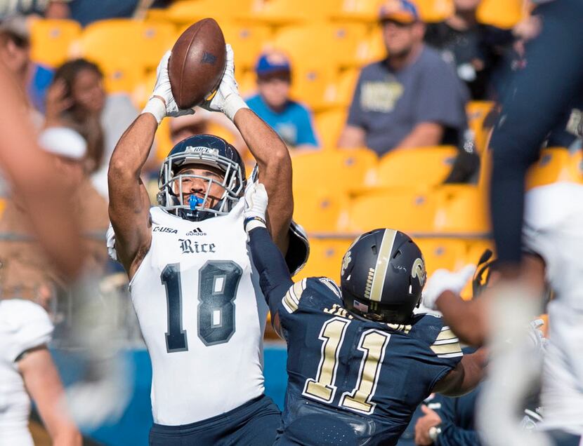 Rice's Kylen Granson (18) catches a pass over Pittsburgh defensive back Dane Jackson (11) on...