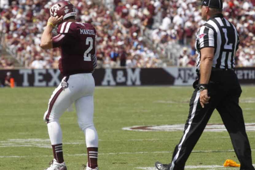 Texas AM Aggies quarterback Johnny Manziel (2) is called for an unsportsmanlike conduct...