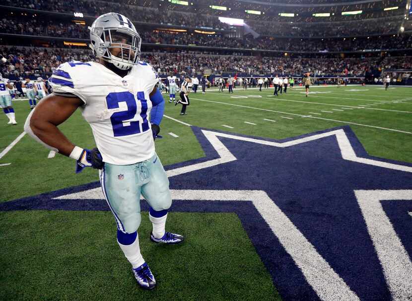 FILE - In this Sunday, Oct. 8, 2017, file photo, Dallas Cowboys' Ezekiel Elliott stands on...