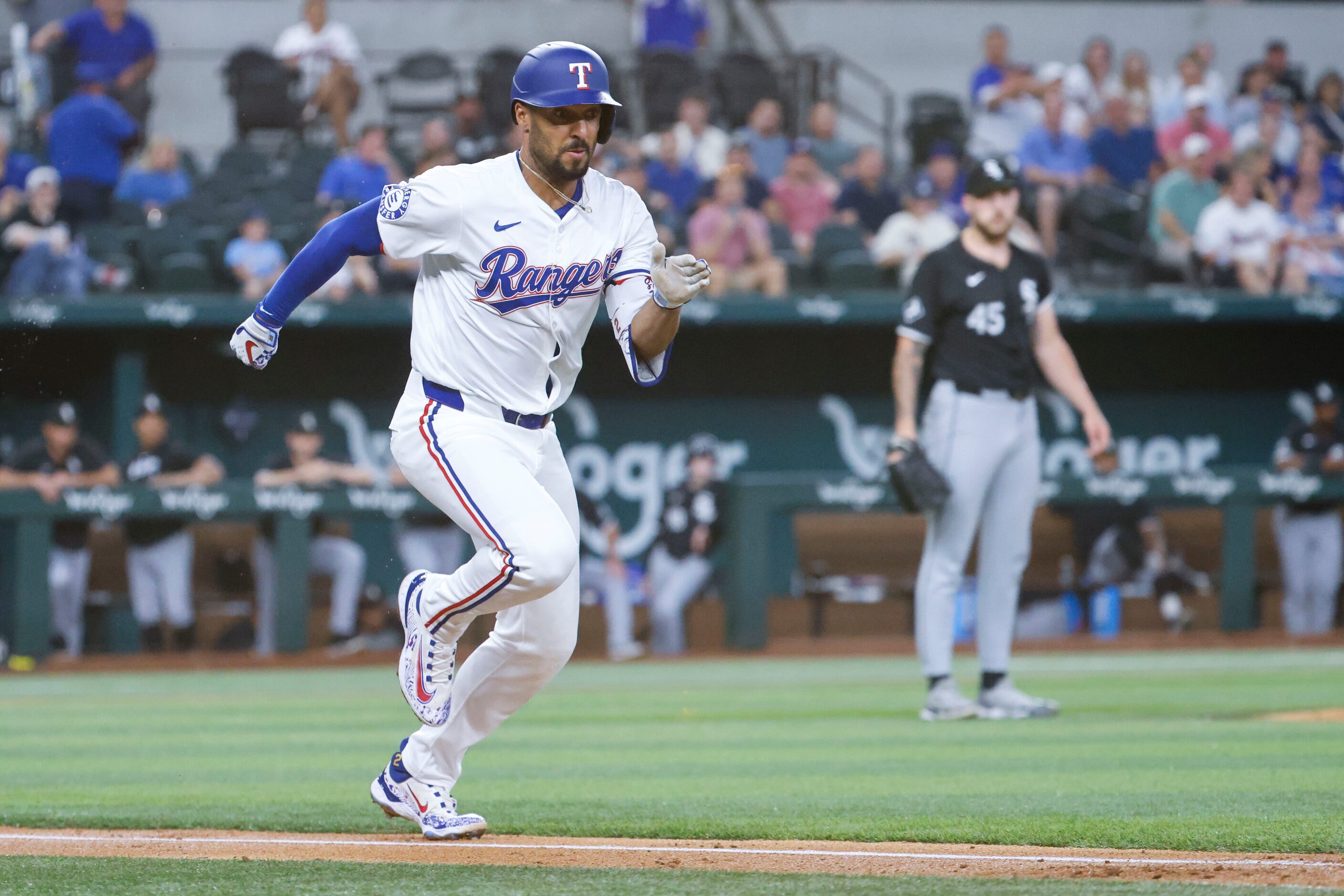 Marcus Semien (2) runs to the first base for a single during the third inning of a baseball...