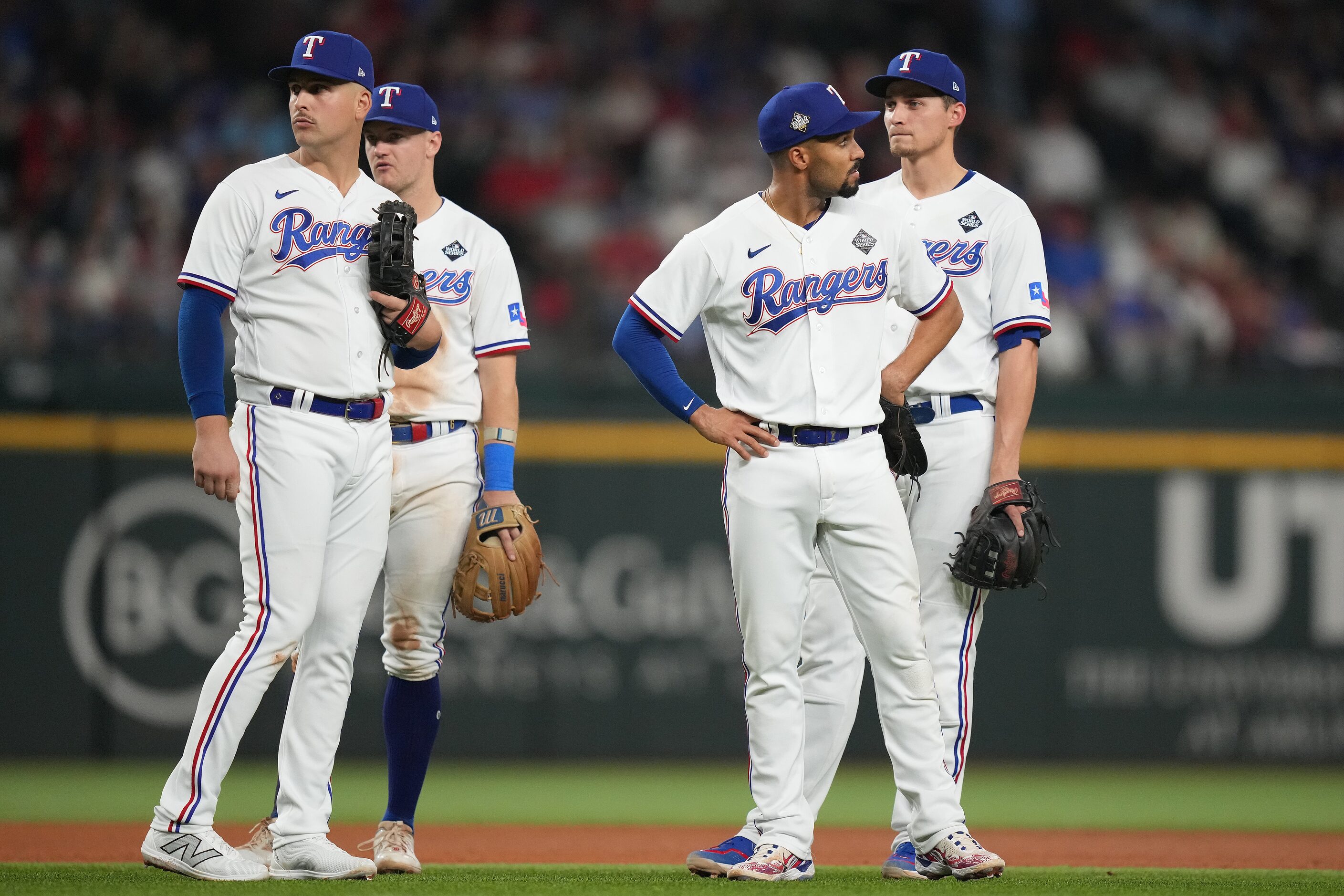 Texas Rangers first baseman Nathaniel Lowe, third baseman Josh Jung, second baseman Marcus...