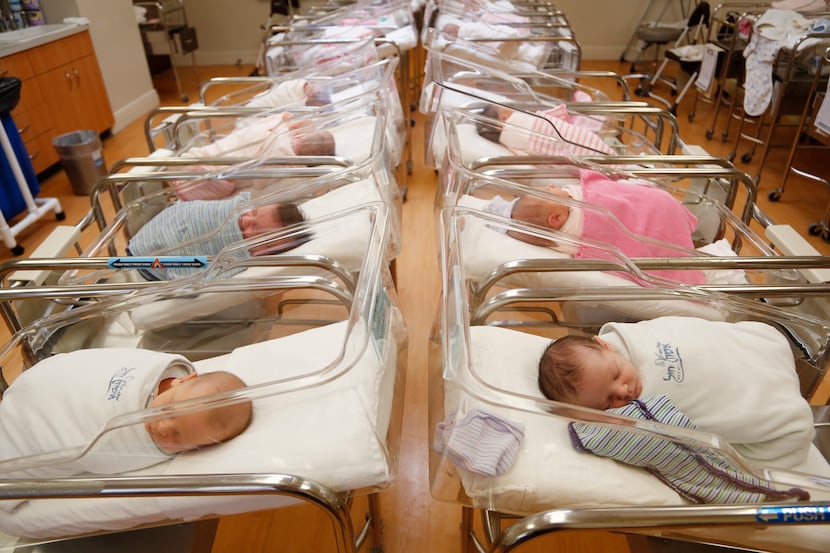 In this Feb. 16, 2017, file photo newborns rest in the nursery of Aishes Chayil, a...