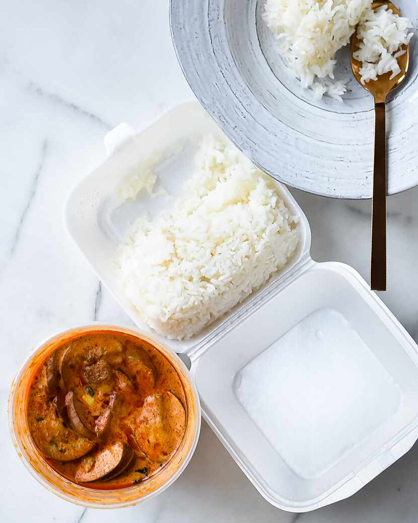 Classic white rice can be served with red chicken curry.
